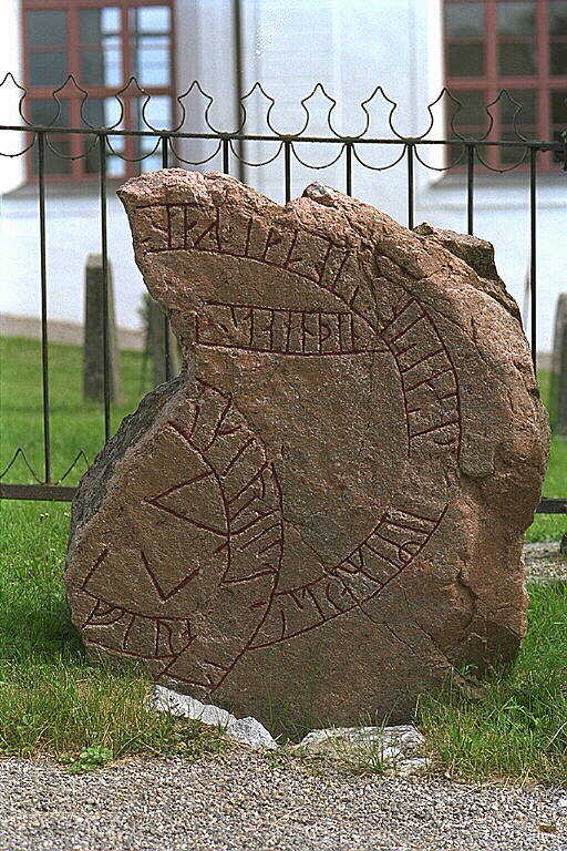 Runes written on fragment av runsten, granit. Date: V